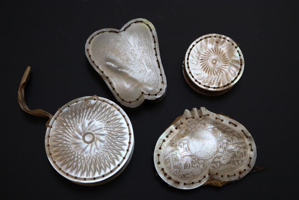 Eight assorted 19th century mother of pearl mounted pin cushions
